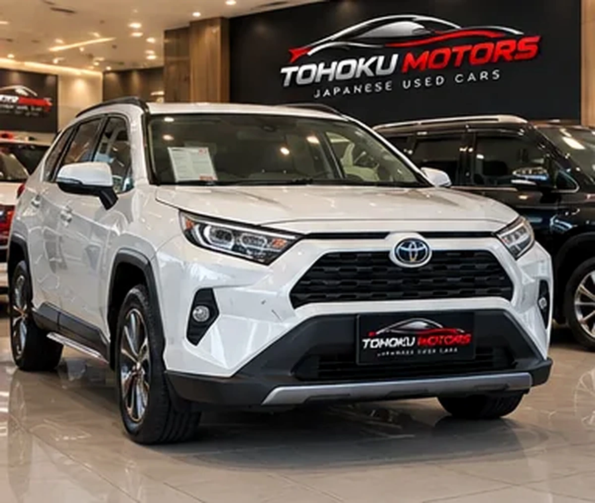 Japanese car displayed in a modern indoor showroom